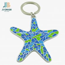 Llavero colgante de las estrellas de mar del metal de la decoración colorida de la aleación superventas superventas